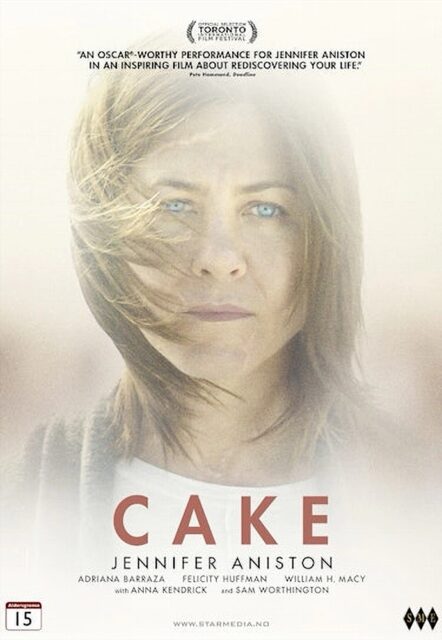 Film cover for "Cake" (2014) featuring Jennifer Aniston. The cover shows a close-up of Aniston's face with a serious expression, her hair blowing in the wind, and a soft-focus background. The title "CAKE" is prominently displayed below her image.