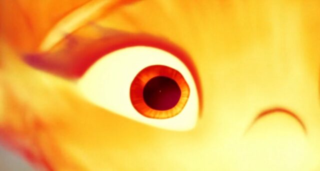 A close-up of Ember's wide-open right eye with fiery tones surrounding it, as the camera zooms in to transition into her fantasy about the incompatibility of fire and water elements.