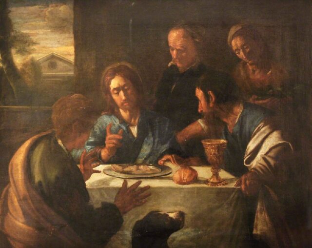 Painting depicting Jesus Christ revealing Himself to two disciples after His resurrection at the supper in Emmaus. The moment captures their astonishment as they recognize Him. Jesus is seated at the center, gesturing with His hands, while the two disciples, one standing and the other sitting, react with amazement. The table is set with bread, fruit, and a roasted chicken, and a dark background contrasts with the bright light illuminating the figures. In the background of the image, through what appears to be a window or opening, there is a building with a triangular pediment, possibly resembling a classical or religious structure. The building has a circular feature at its center, which could be a window or a decorative element, symbolizing perhaps an eye or another religious symbol, such as the Eye of Providence.