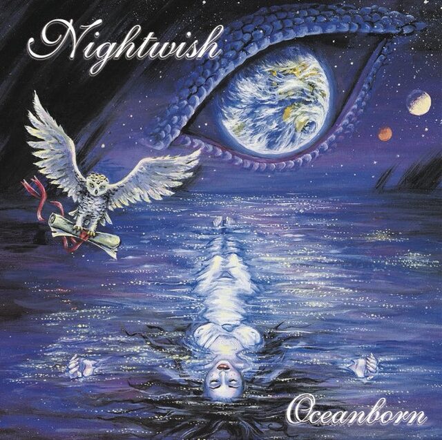 Album cover for "Oceanborn" by Nightwish, featuring a surreal image of a large, reptilian eye in the sky, with the planet Earth as the eye's iris. Below, a woman floats on her back in a calm, dark ocean, her arms crossed over her chest. An owl with a scroll in its talons flies near the woman, set against a cosmic background with stars and planets.