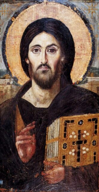 The original Christ Pantocrator icon from Saint Catherine's Monastery in Sinai. Jesus is portrayed with an asymmetrical face, holding a Gospel in his left hand and making a blessing gesture with his right hand, with a halo around his head.