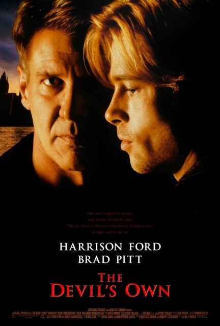 The movie poster for "The Devil's Own" shows Tom O'Meara with only his right eye visible, as his left eye is completely obscured by shadow and by Rory Devaney's face. Rory is positioned in profile, so only the left side of his face is visible, highlighting his left eye.